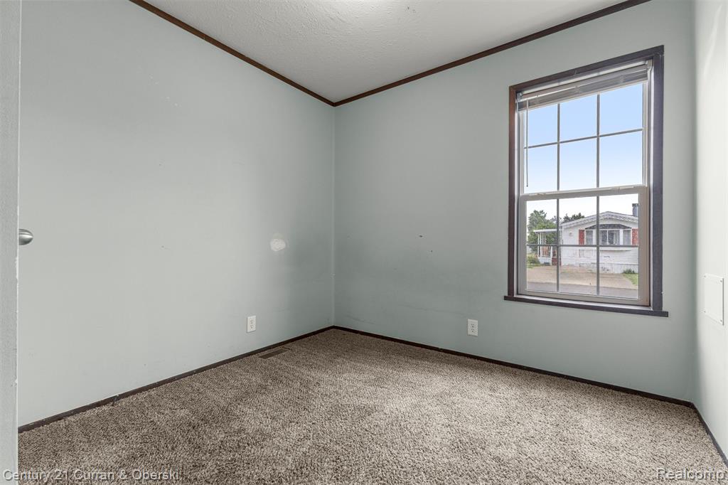 76 Fawn Lake Drive, Walled Lake, MI 48390 — Photo 16