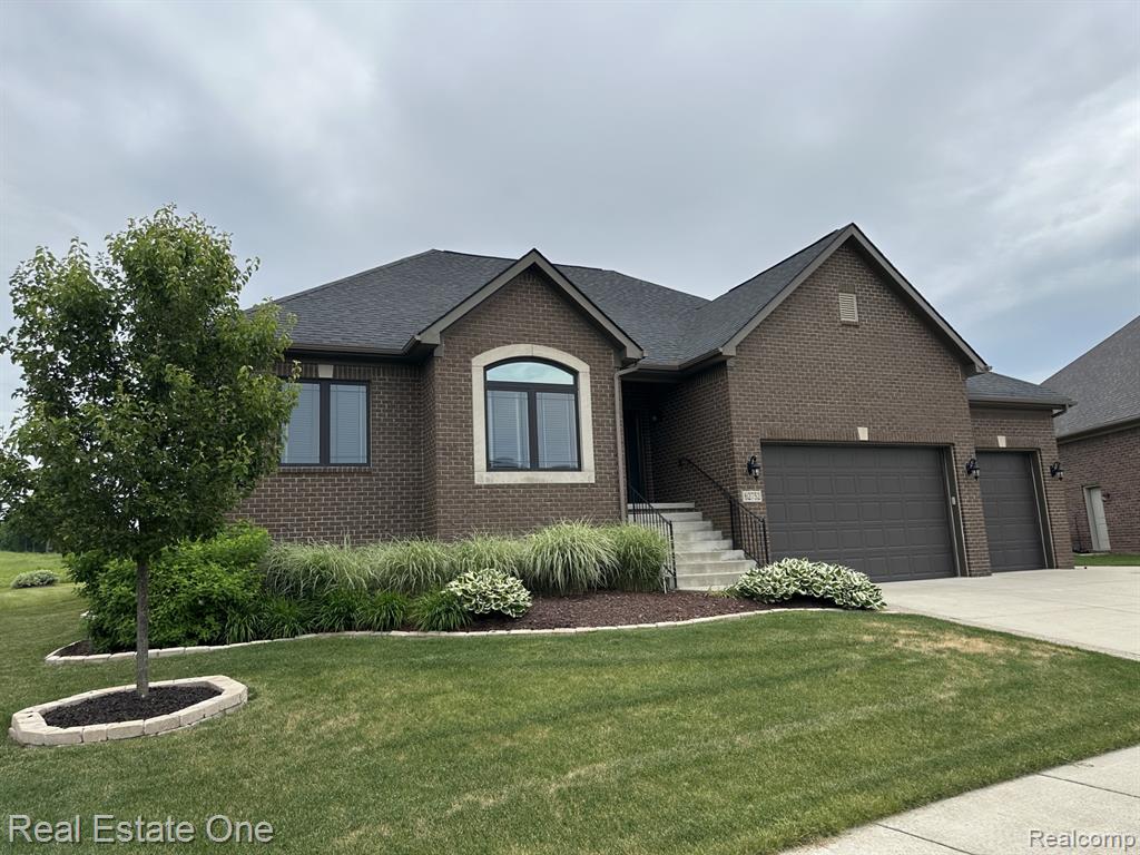 62752 Sawgrass Drive, Washington, MI — front exterior
