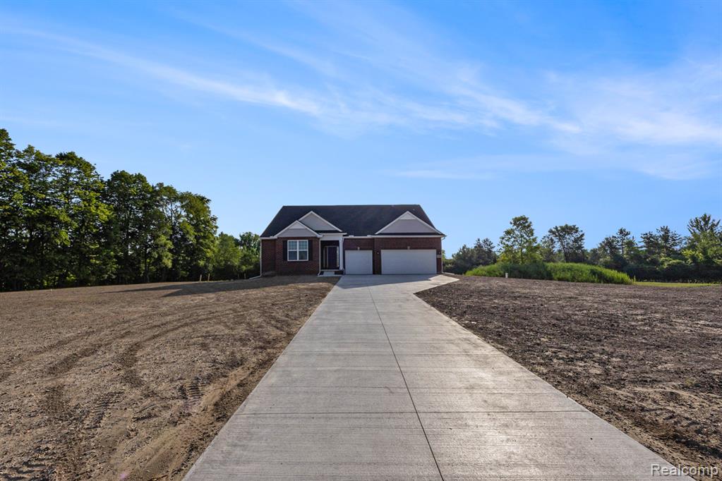7557 Orchard Lane, Washington, MI 48095 — front exterior