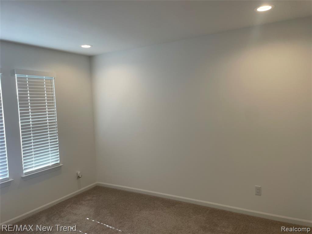 205 Monument Lane, Wixom, MI 48393 — Photo 15