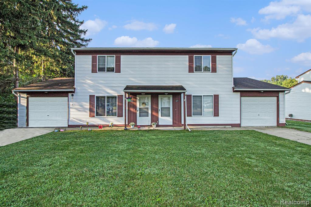 505 Garden Lane, Fowlerville, MI 48836 — front exterior