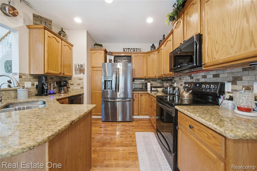 5361 Universe Avenue, Howell, MI 48843 — Photo 9
