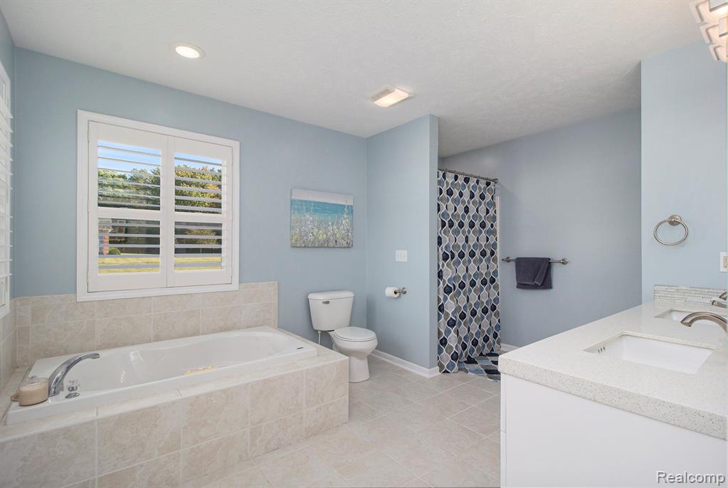 703 N Hughes Road, Howell, MI 48843 — Photo 16