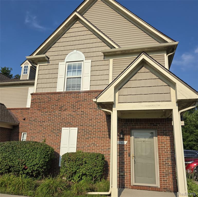 27601 Hidden Oaks Drive, Brownstown, MI 48183 — front exterior
