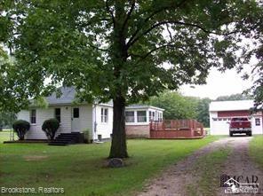 8990 HISER Road, Milan, MI 48160 — front exterior