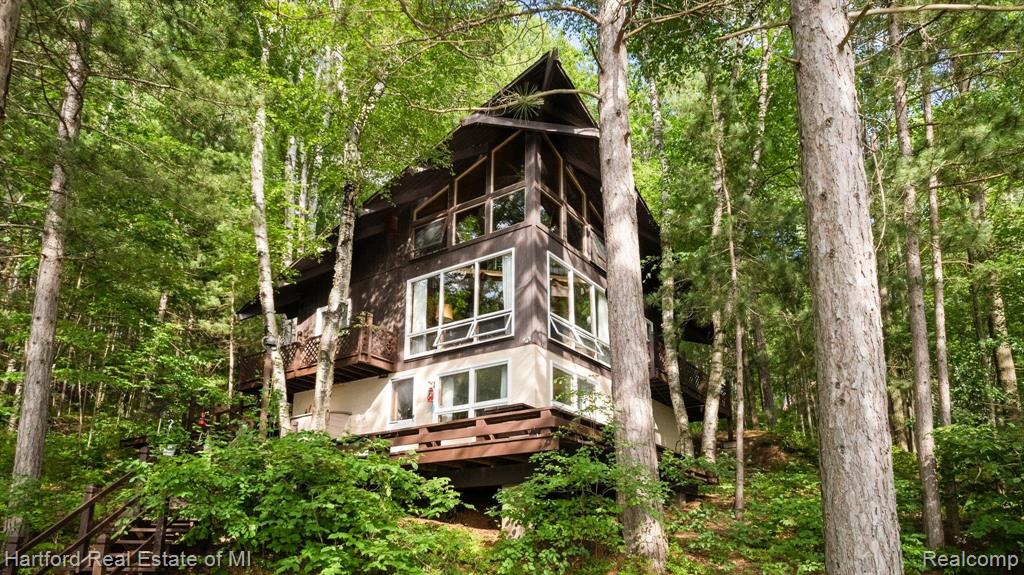 7643 K P LAKE ROAD, Grayling, MI 49738 — front exterior