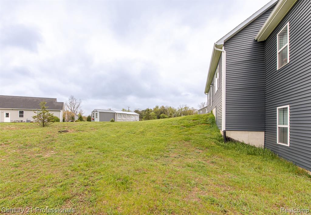 4914 Toratola Lane, Howell, MI 48843 — Photo 38