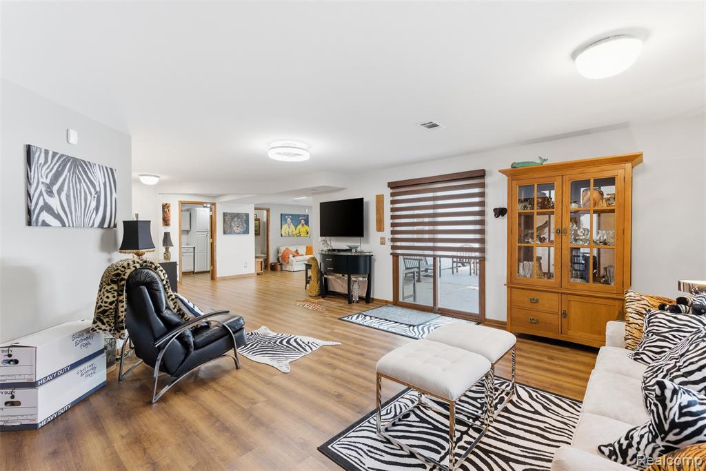 Living area featuring light wood-type flooring