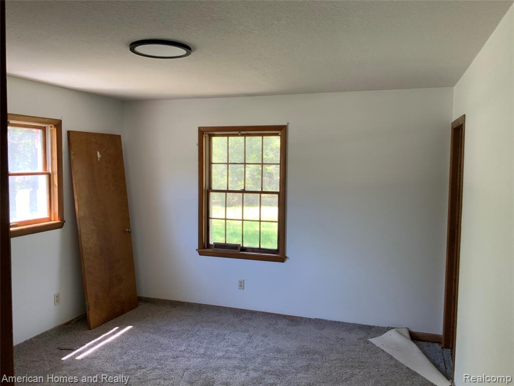 7395 Crestwood Drive, Oscoda, MI 48750 — Photo 9