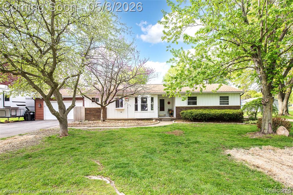 222 Bain Drive, Howell, MI 48855 — front exterior