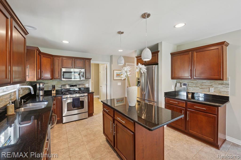 8927 Giovanni Ct, Howell, MI 48855 — Photo 10