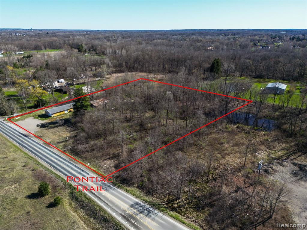 8860 PONTIAC Trail, South Lyon, MI 48178 — front exterior