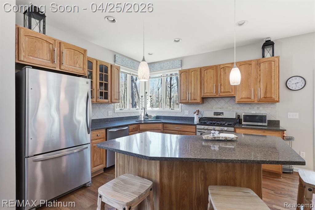 7548 Elmbrooke Way, Brighton, MI 48116 — Photo 10