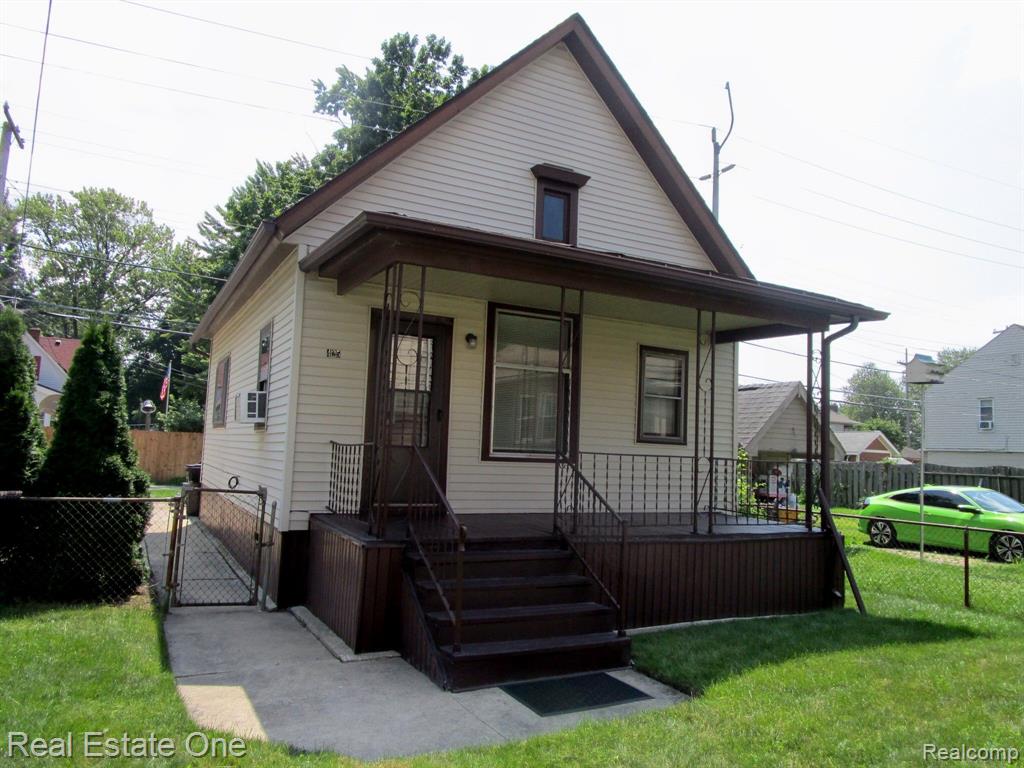 421 POPLAR Street, Wyandotte, MI 48192 — front exterior