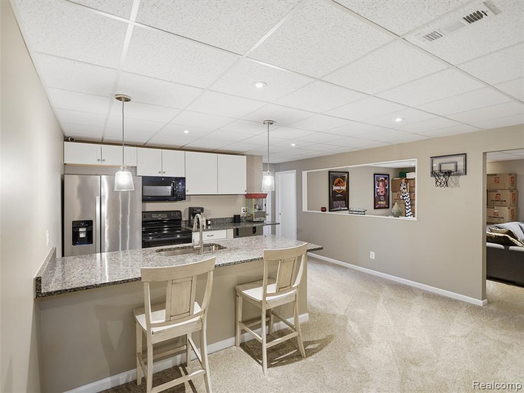 9095 Rotondo Drive, Howell, MI 48855 — Photo 21