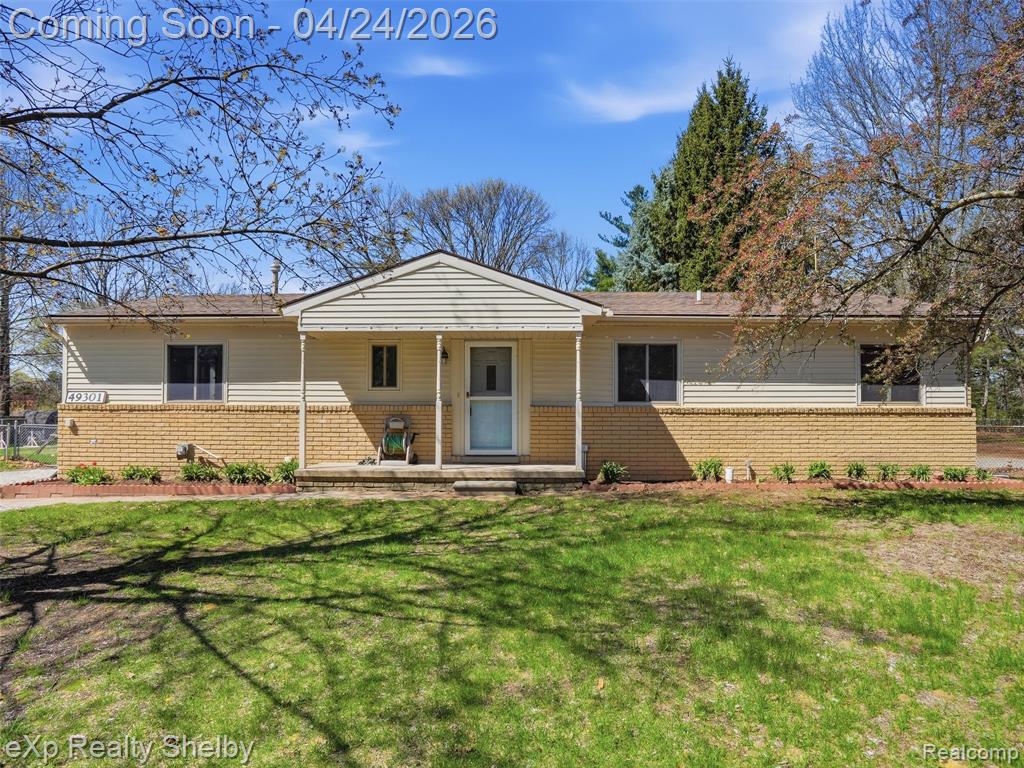 49301 Schoenherr Road, Shelby Twp, MI 48315 — front exterior