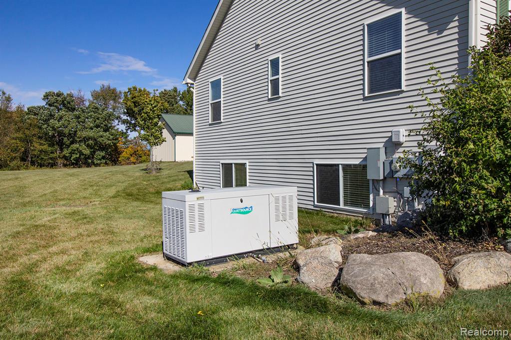 703 N Hughes Road, Howell, MI 48843 — Photo 30