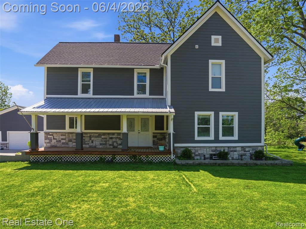 879 N Hacker Road, Howell, MI 48843 — Photo 2