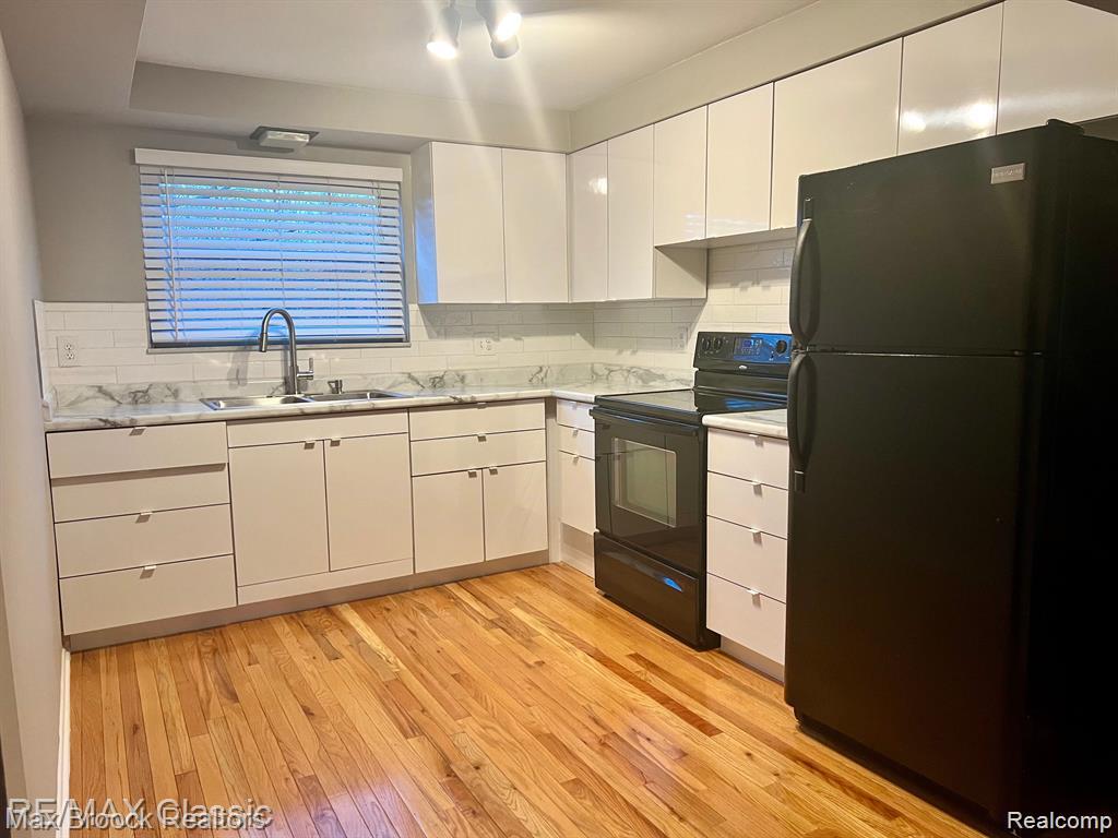 615 Leon Road, Walled Lake, MI 48390 — Photo 16