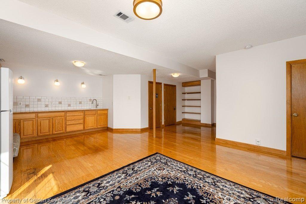 573 WINWOOD, Unit 34, Walled Lake, MI 48390 — Photo 20
