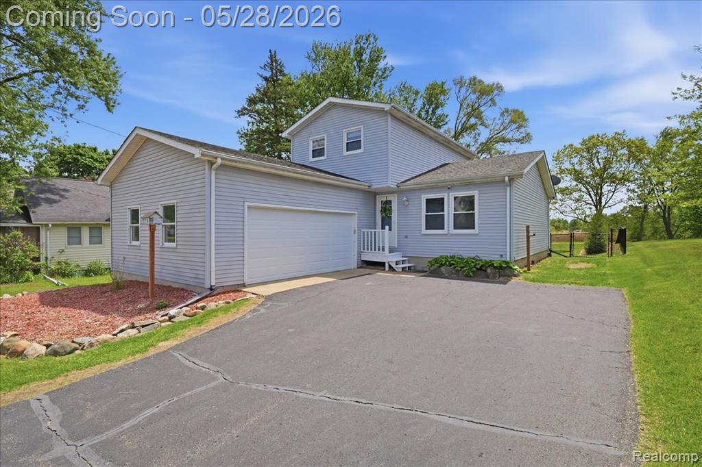 142 Mill Street, Ortonville, MI 48462 — front exterior