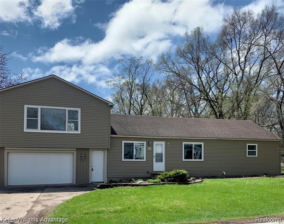 689 LUCILLE Drive, Wolverine Lake, MI 48390 — front exterior