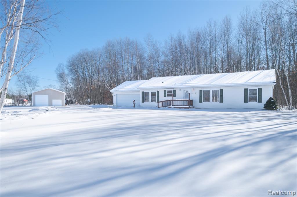 11944 N Wise Road, Clare, MI 48617 — front exterior
