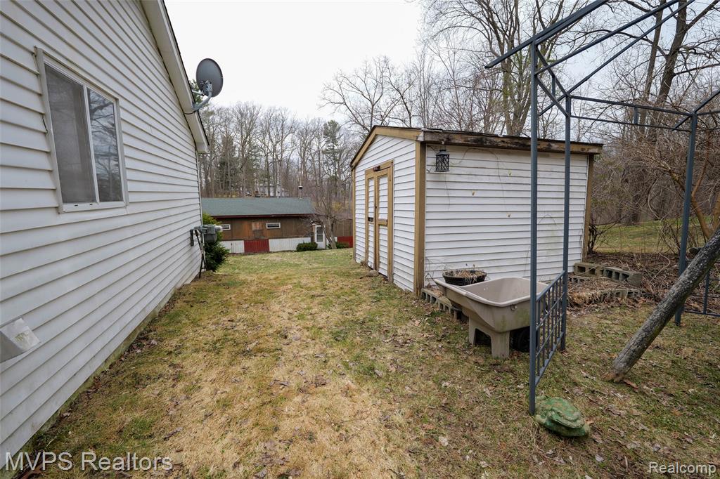 1721 Moffat Road, Leonard, MI 48367 — Photo 28