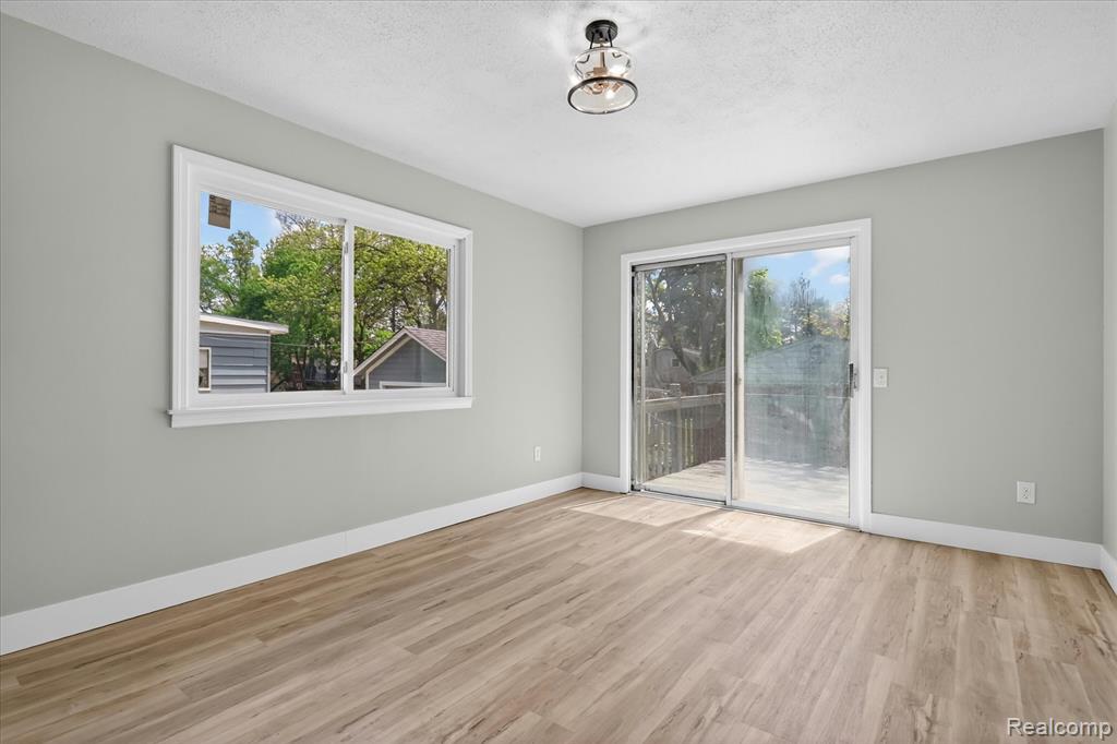 677 Lucille Drive, Wolverine Lake, MI 48390 — Photo 15