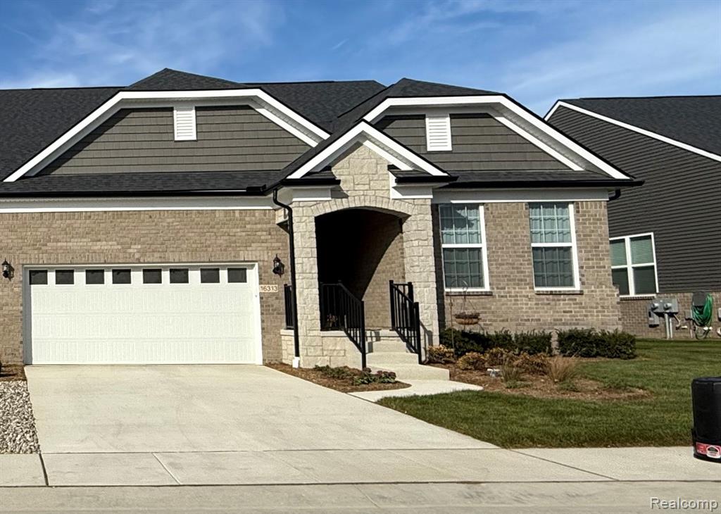 55733 Oak Pointe Drive, Shelby Twp, MI 48315 — front exterior