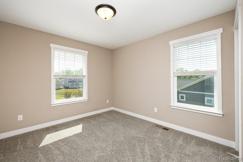 9261 Regency Boulevard, Pinckney, MI 48169 — Photo 21