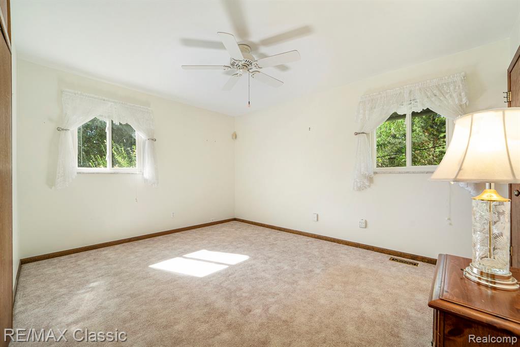 822 Manzano Drive, Wolverine Lake, MI 48390 — Photo 16