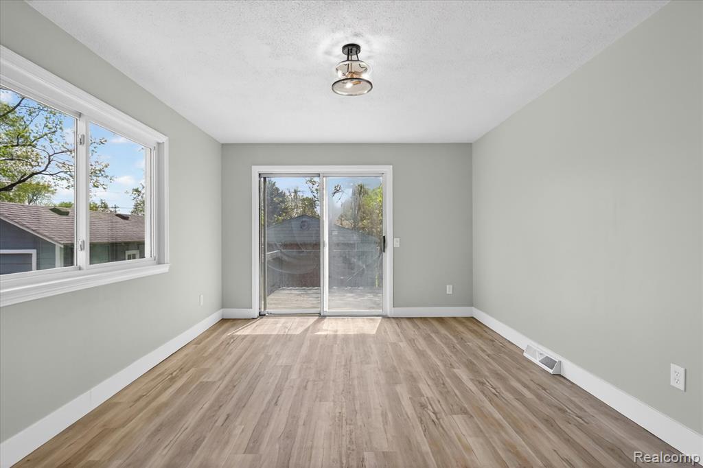 677 Lucille Drive, Wolverine Lake, MI 48390 — Photo 16