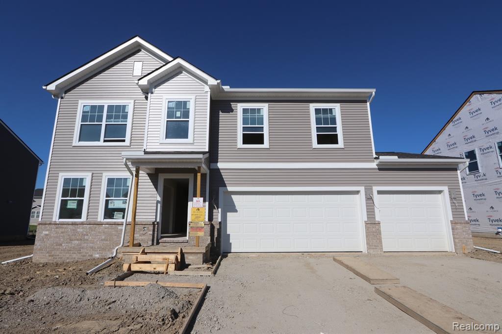 54791 Heron Circle, Chesterfield, MI 48047 — front exterior