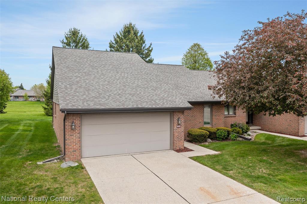 16061 Meadows Drive, Macomb, MI 48044 — front exterior