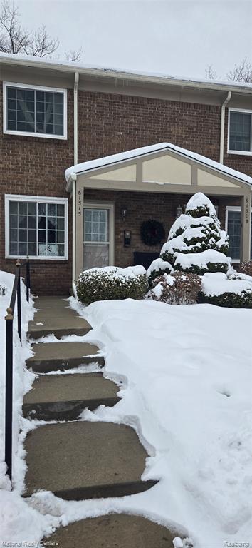 61315 Heritage Boulevard, 4, South Lyon, MI 48178 — front exterior