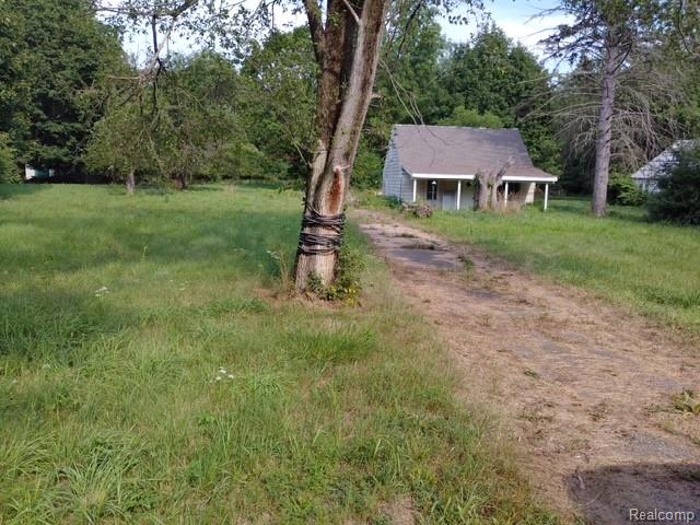 5090 Jackson Road, Flint, MI 48506 — front exterior