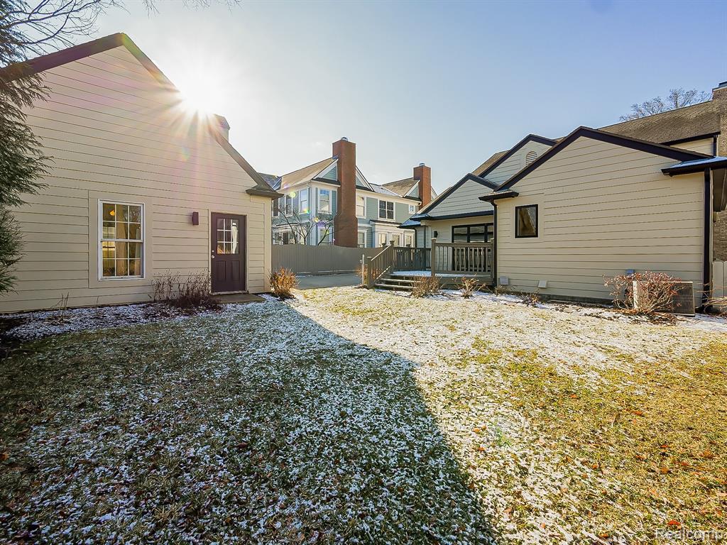 Rear view of property with a deck