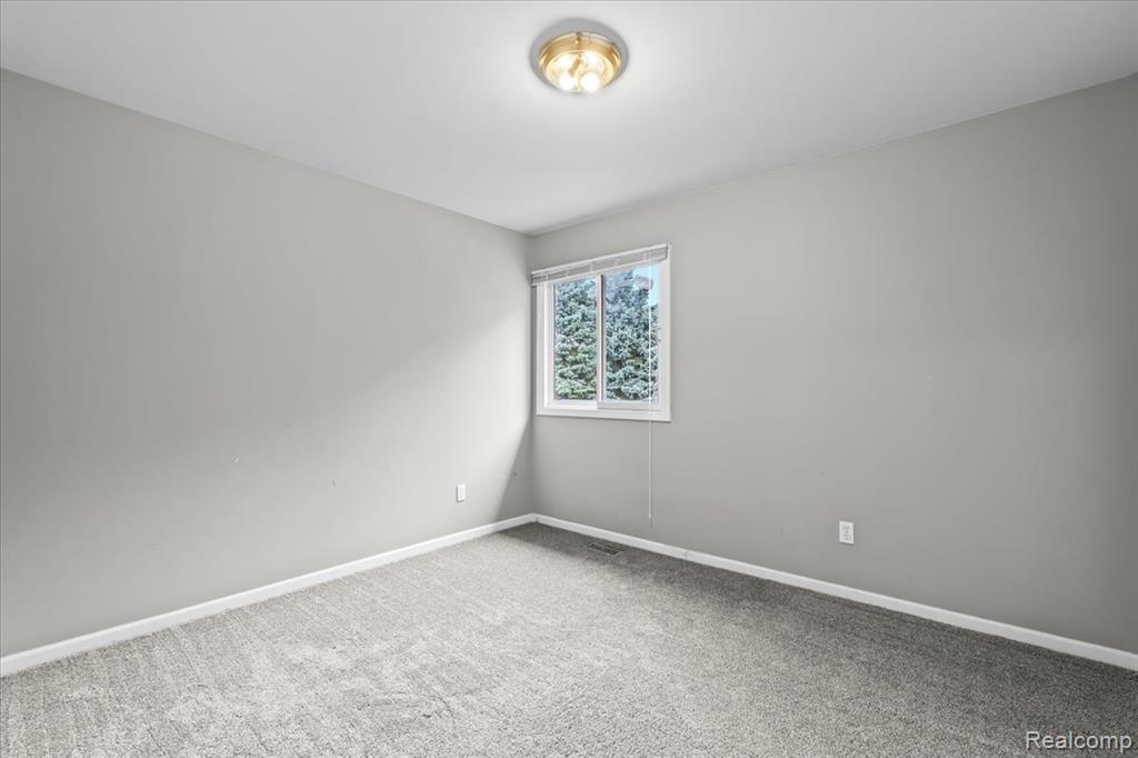 8477 Mist Field Court, Howell, MI 48843 — Photo 22