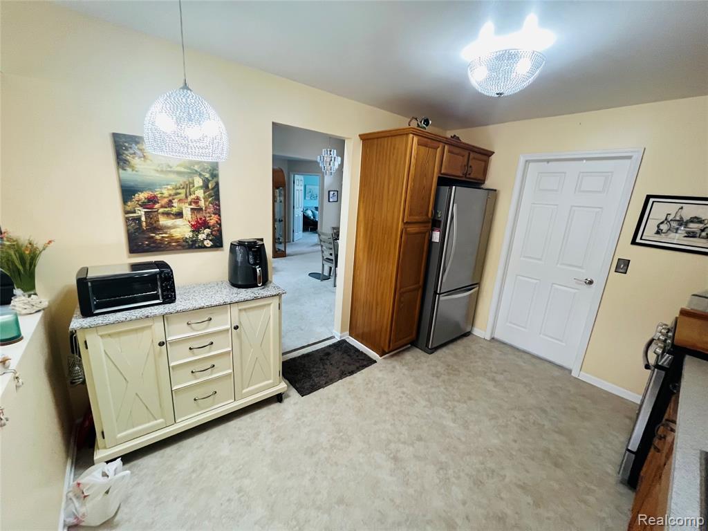 828 Woodhaven Drive, Commerce Twp, MI 48390 — Photo 13