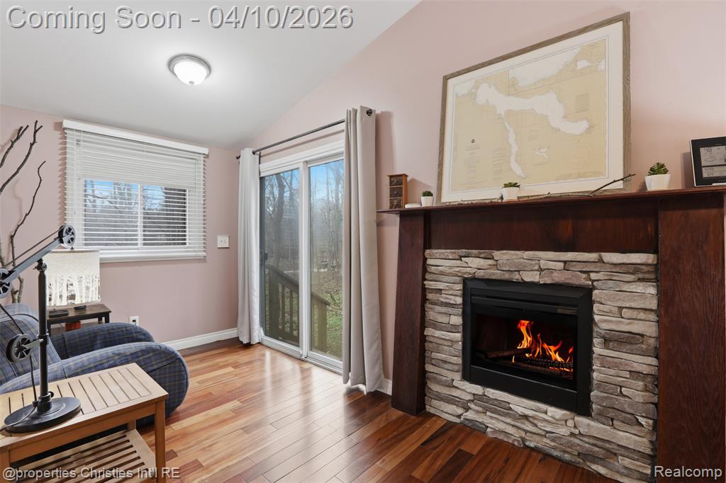 Sitting room has it's own slider out to the private wooded backyard.