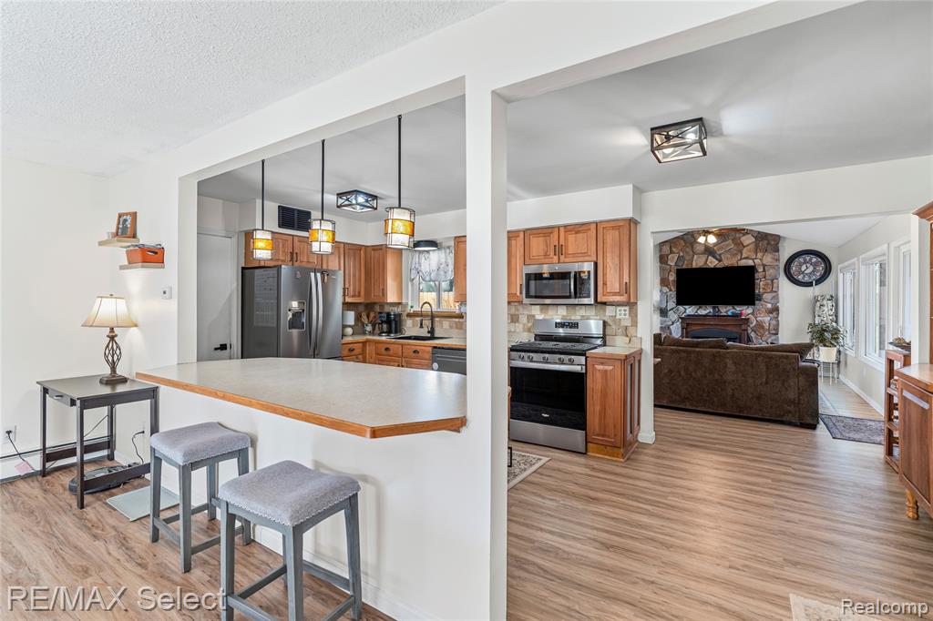 9367 Longmeadow Court, Fenton, MI 48430 — Photo 18