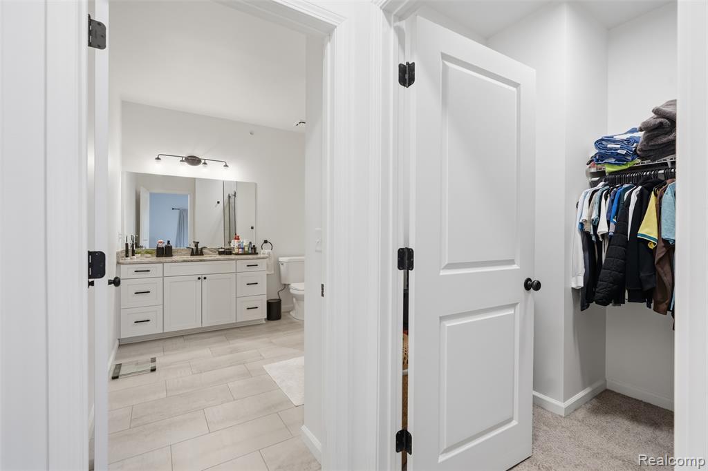 606 Pointe Drive, Walled Lake, MI 48390 — Photo 21