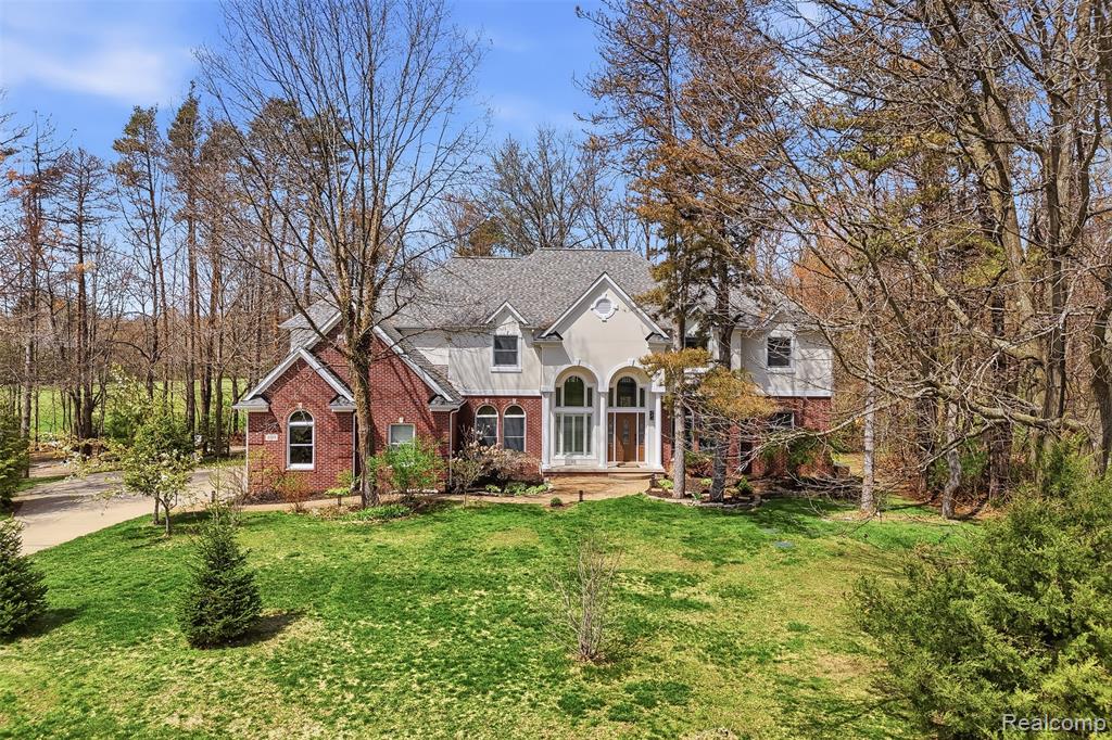 4148 Queensland Way, Pinckney, MI 48169 — front exterior