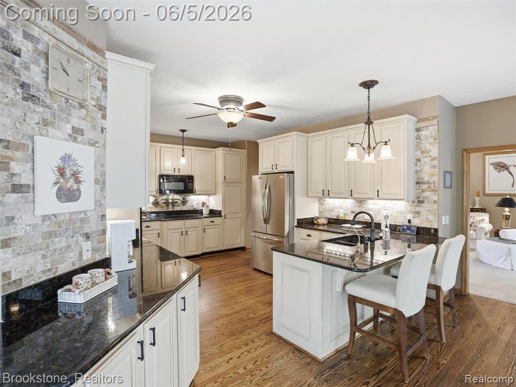9523 Quail Ridge Run, Brighton, MI 48114 — Photo 35