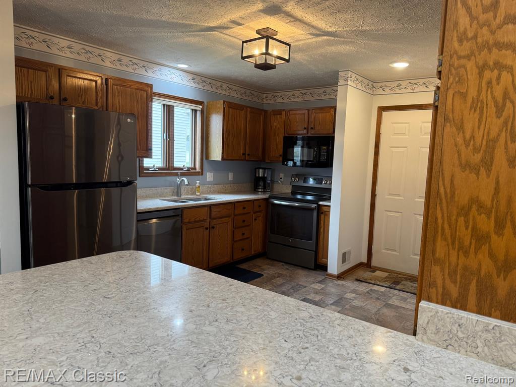 5855 Caleta Drive, Lansing, MI 48911 — Photo 11