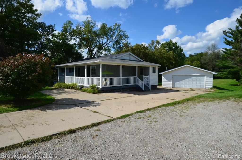 10083 HEGEL Road, Goodrich Vlg, MI — front exterior