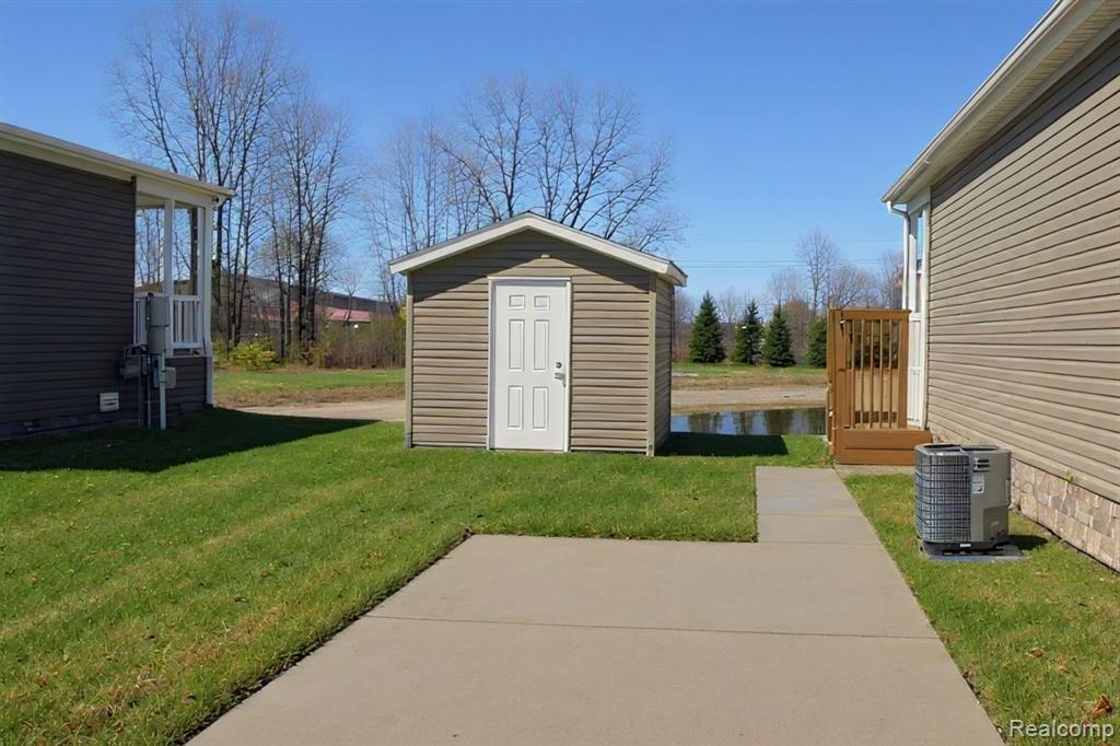 8447 S Brookston Drive, Willis, MI 48191 — Photo 30