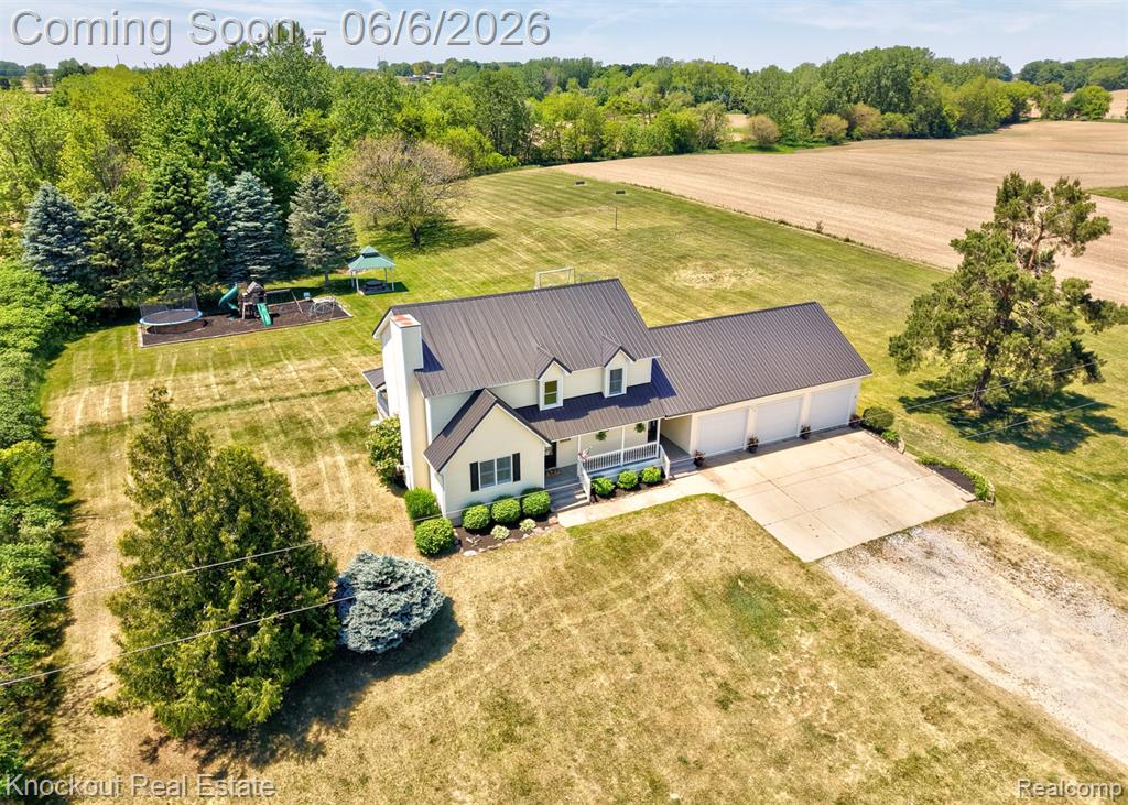 7616 Fostoria Road, Mayville Vlg, MI 48744 — front exterior