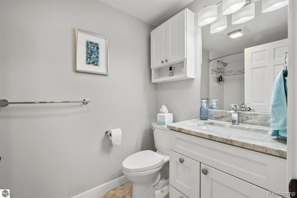 9086 N TOTTENHAM Drive, Traverse City, MI 49685 — Photo 43
